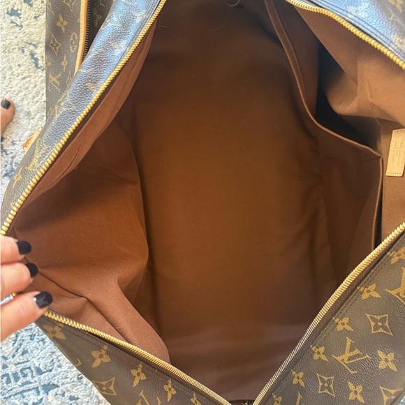 Louis Vuitton canvas rolling duffle bag, gently used. - Picture 8 of 14